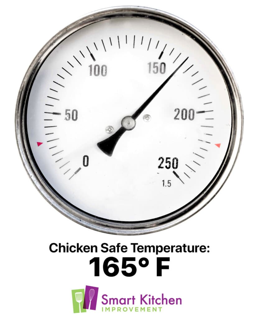 Thermometer showing 165 degrees which is the safe temperature for Chicken